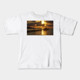 Father and Child at sunrise alcudia beach Kids T-Shirt